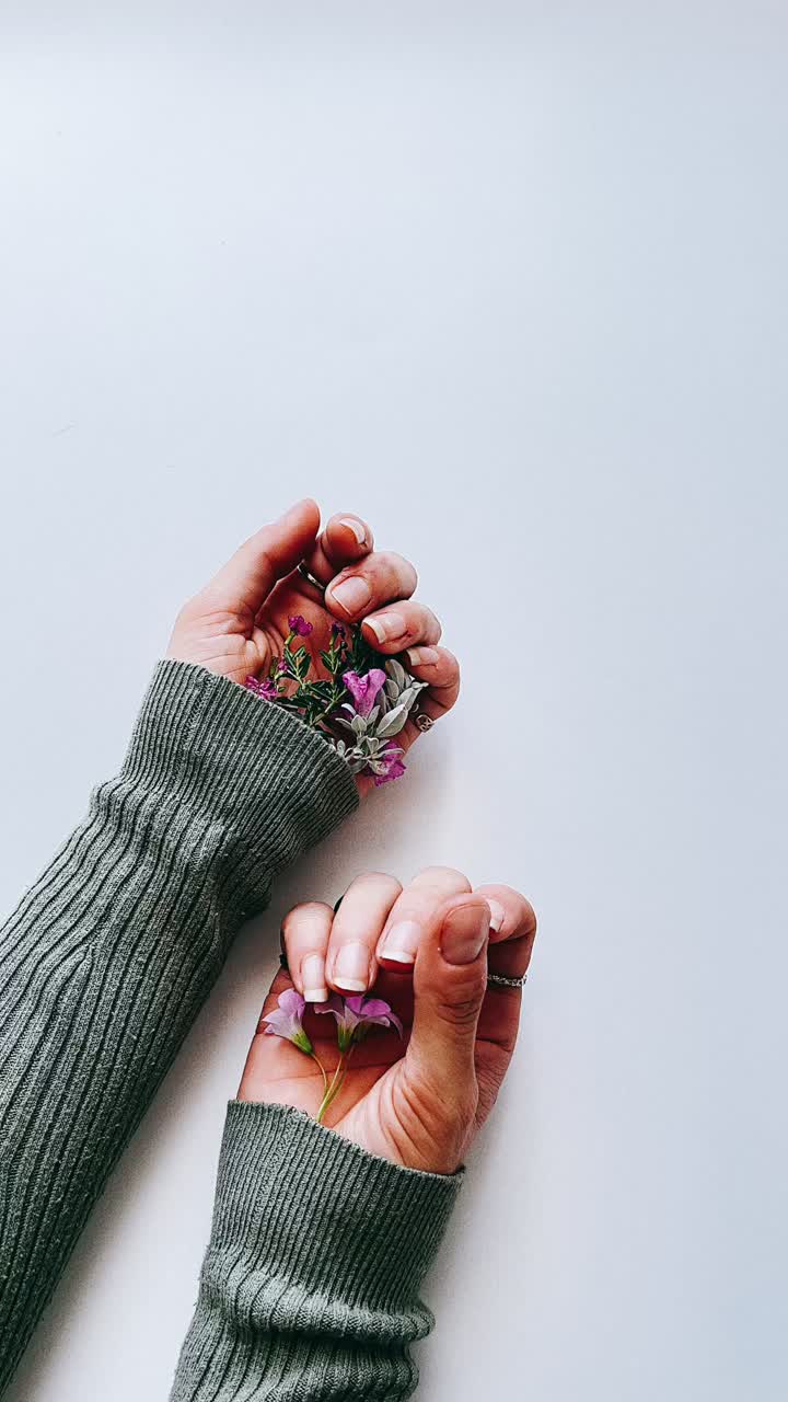 Hands Holding Flowers