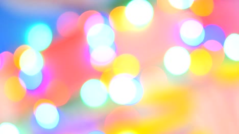 blurred colorful lights. red, green, yellow, orange, blue defocused glittering bokeh festive background.