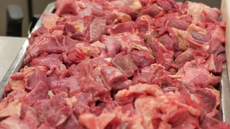 close up of raw beef cubes