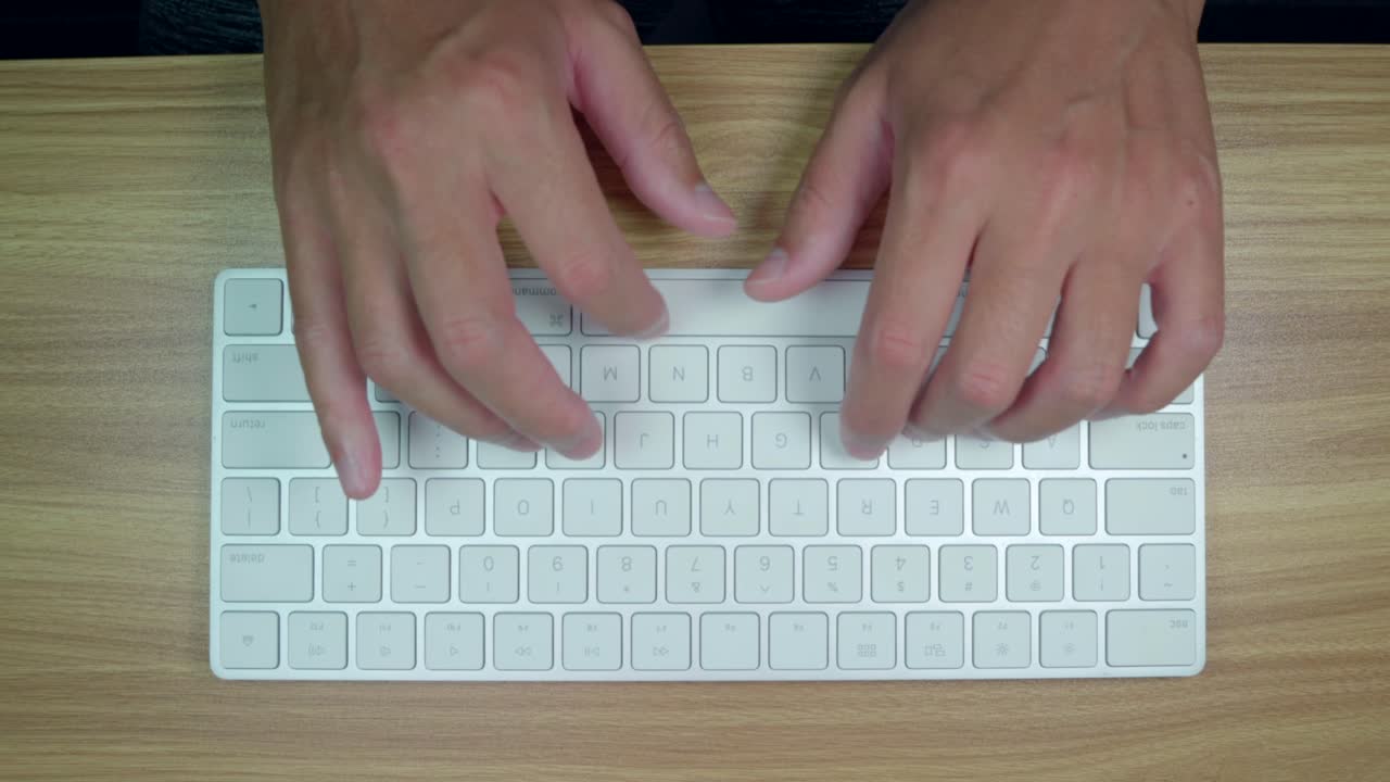 escribir teclado inalámbrico desde un ángulo de 90 grados