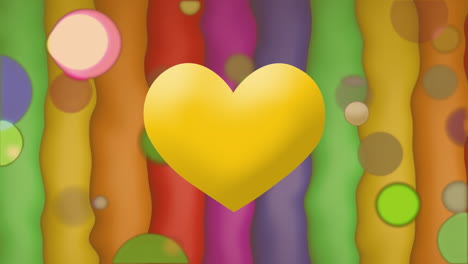 animation of yellow heart icon breaking and colorful spots against colorful striped background