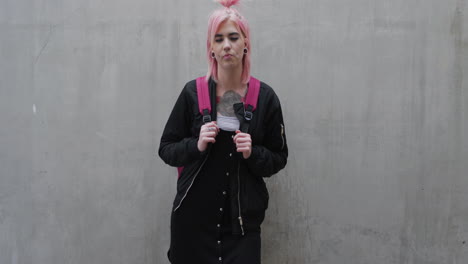 portrait-young-punk-girl-student-pink-hair-looking-confident-independent-caucasian-woman-alternative-fashion-style-on-concrete-wall-background