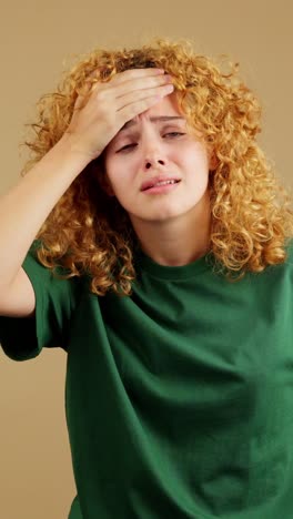 young woman suffering from pain or headache