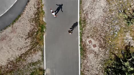 top view of the skaters riding skateboard