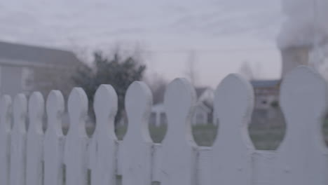 white-fence-in-industrial-neighborhood