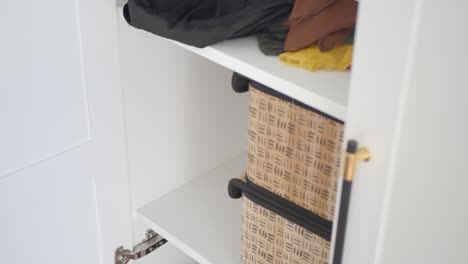 organized closet with storage bins