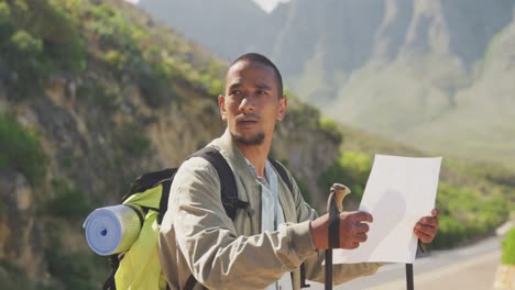 Sporty-mixed-race-man-with-prosthetic-leg-hiking