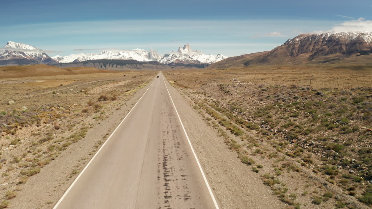 Back View of Girl Waking toward the Los Glaciers National Park at El Chalten near Santa Cruz, Patagonia, Argentina.Explorer Enjoying the Panorama in the Wilderness of the Steppe