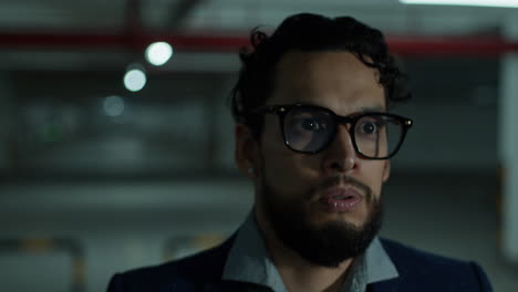 man in a parking garage