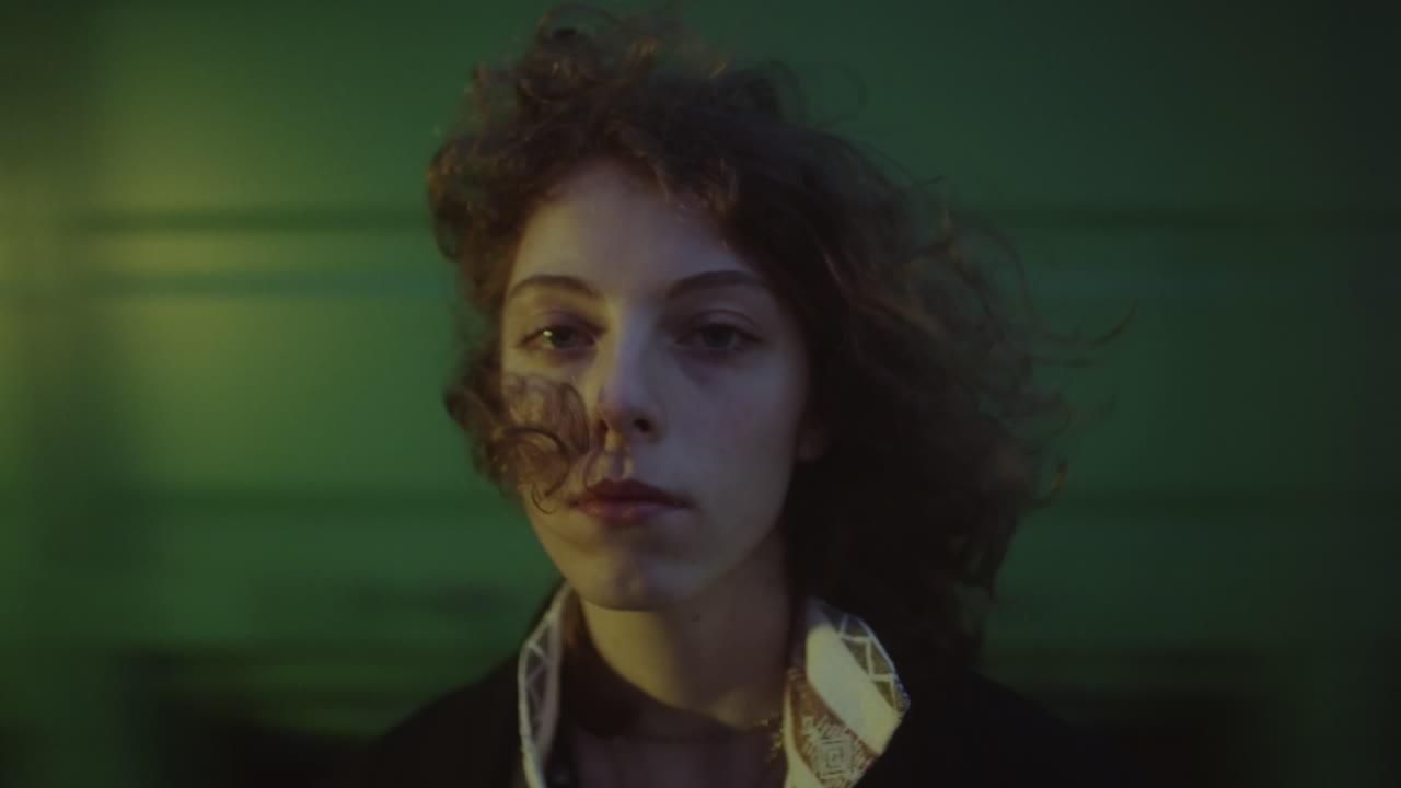 Portrait of Girl with Moving Train in Background