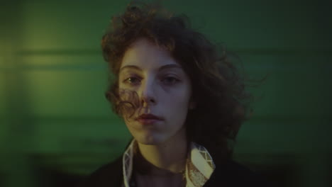 portrait of girl with moving train in background