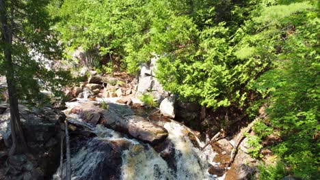 Scenic-View-Of-Duchesnay-Cascades-Over-Rocks-Near-North-Bay,-Ontario,-Canada