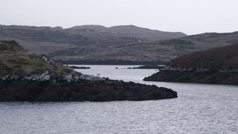 shot of the opening to a sea loch