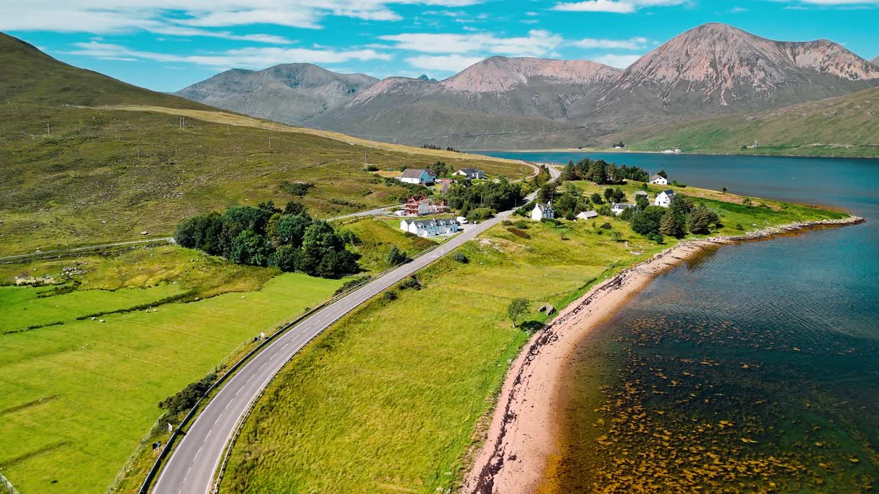 Aerial View of Coastal Landscape with Mountains and Lake