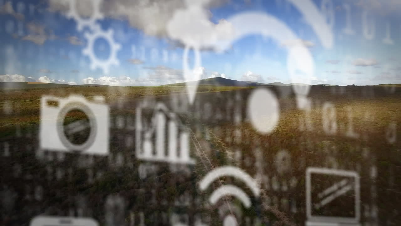 animación de iconos wifi y digitales flotando sobre el paisaje