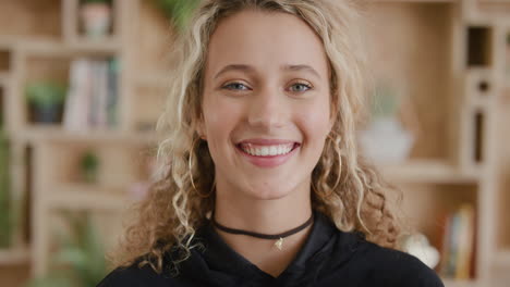 portrait of happy young blonde woman student laughing enjoying success cheerful female satisfaction