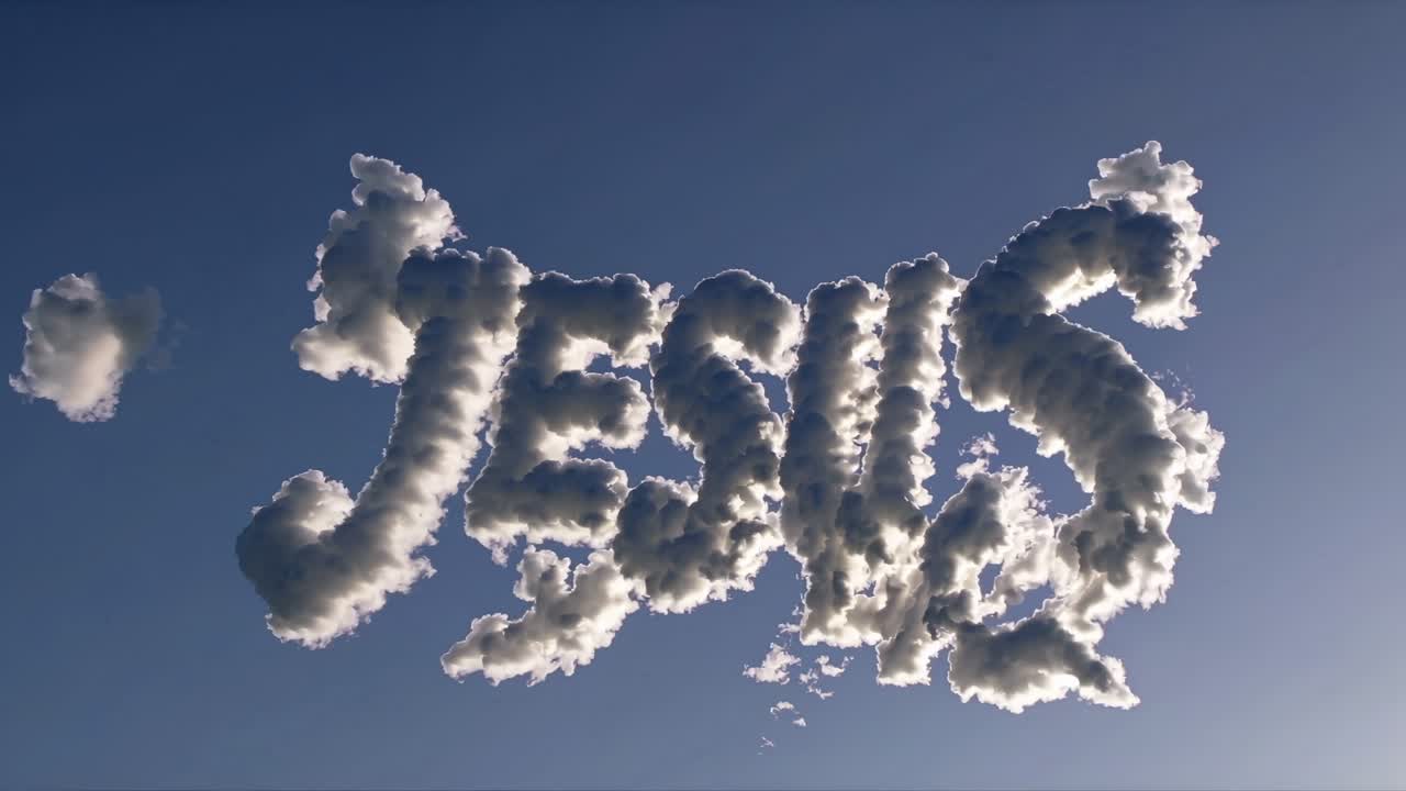 Low-angle shot of clouds forming the word 'Jesus' against a clear sky, capturing a serene