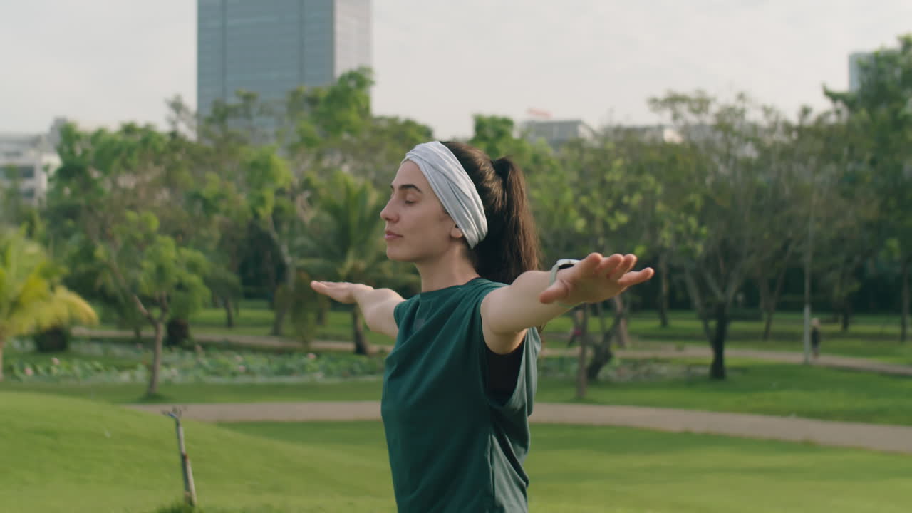 Woman Doing Yoga in Park