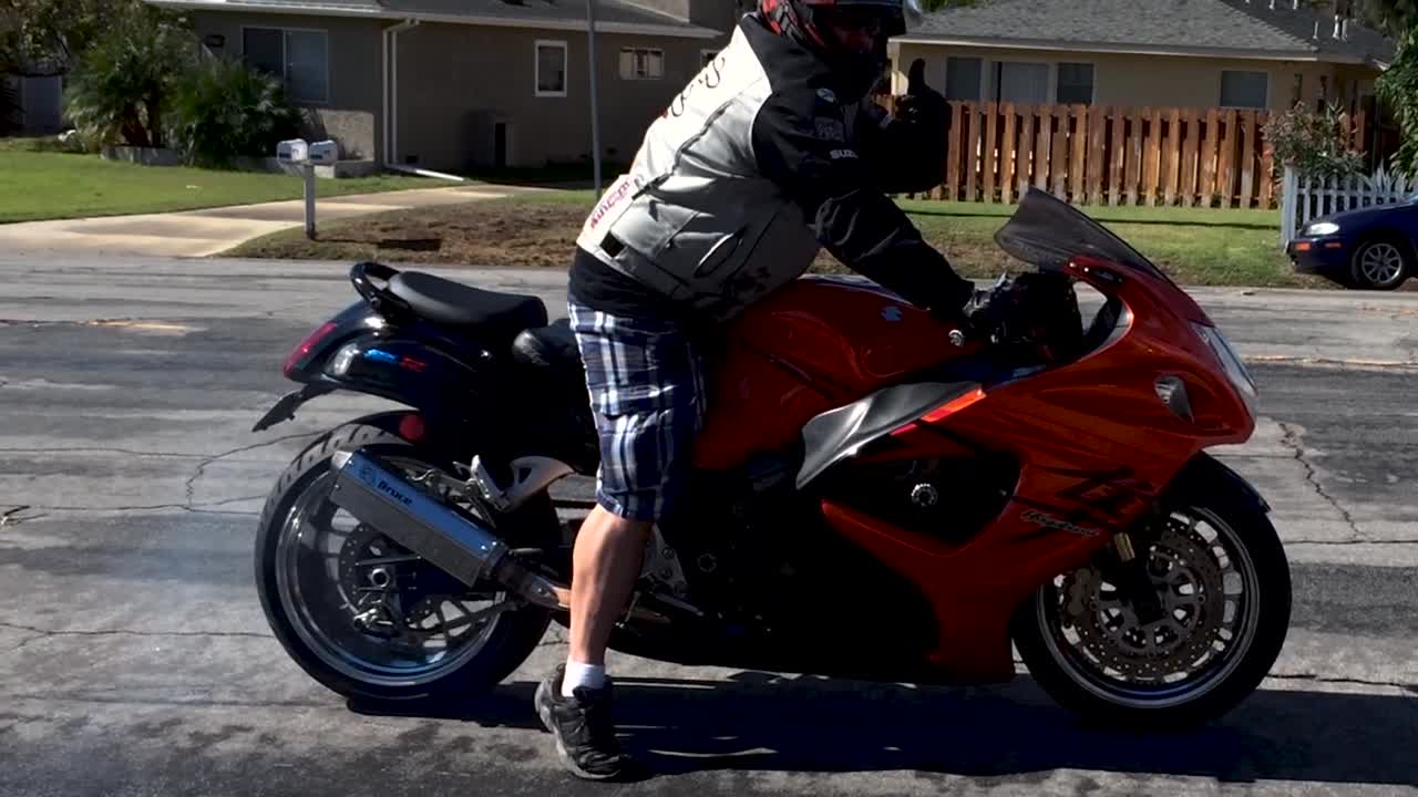 rider peeling out on motorcycle