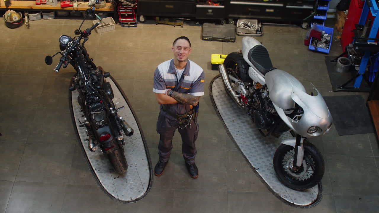 Portrait of Multicultural Mechanic in His Own Motorbike Garage
