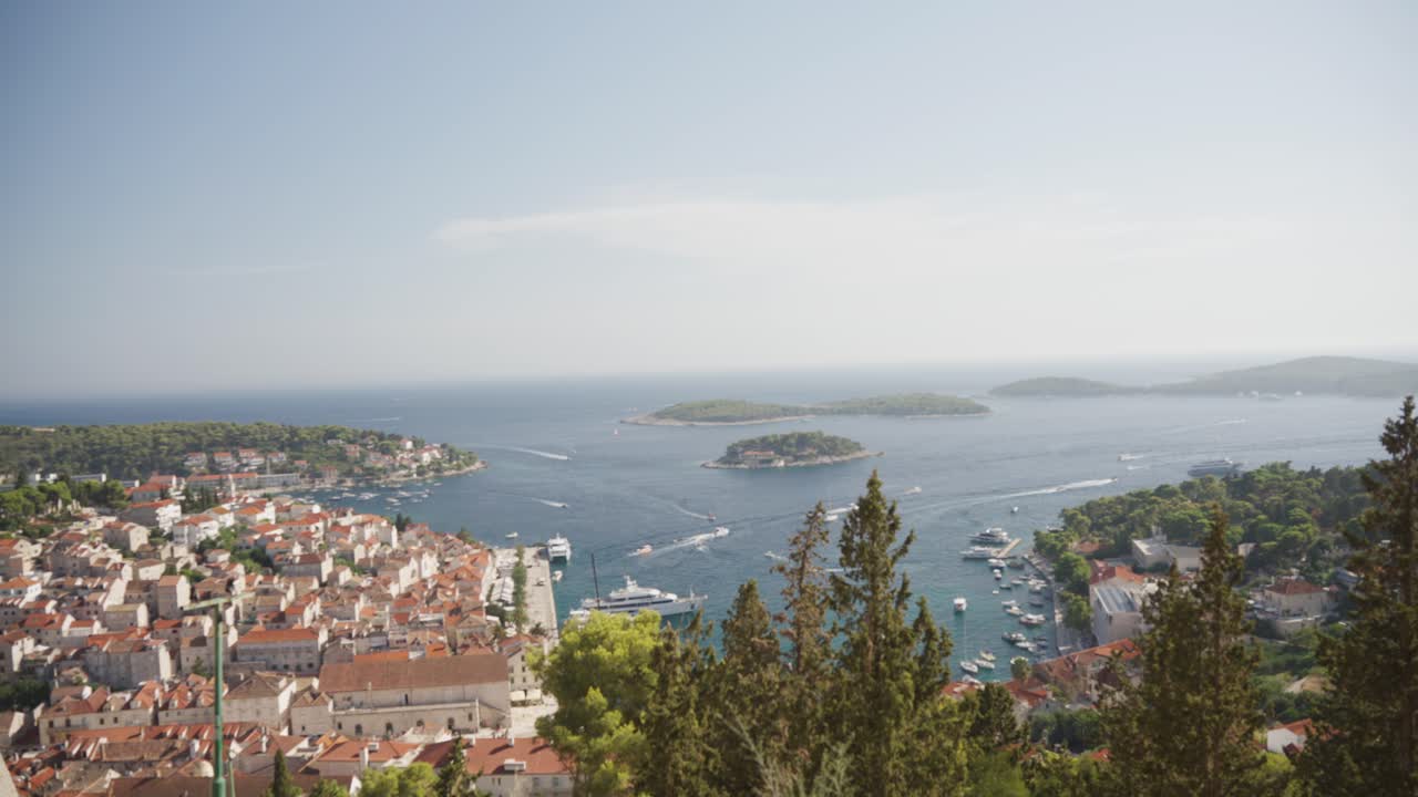 Hvar Port City On The Croatian Island Of Adriatic Sea, Off The Dalmatian Coast. Aerial Drone Shot