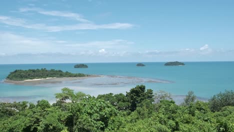 4k slow pan right to left of scenic viewpoint from koh chang overlooking ocean and smaller islands on a summers vacation in thailand