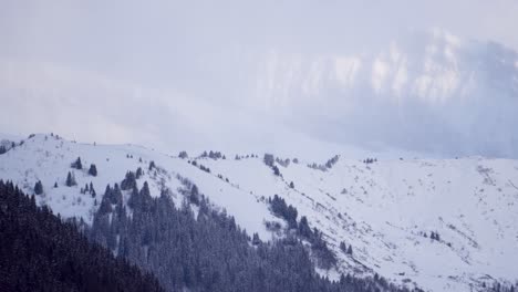 sun rays illuminating big mountain wall in a far background timelapse