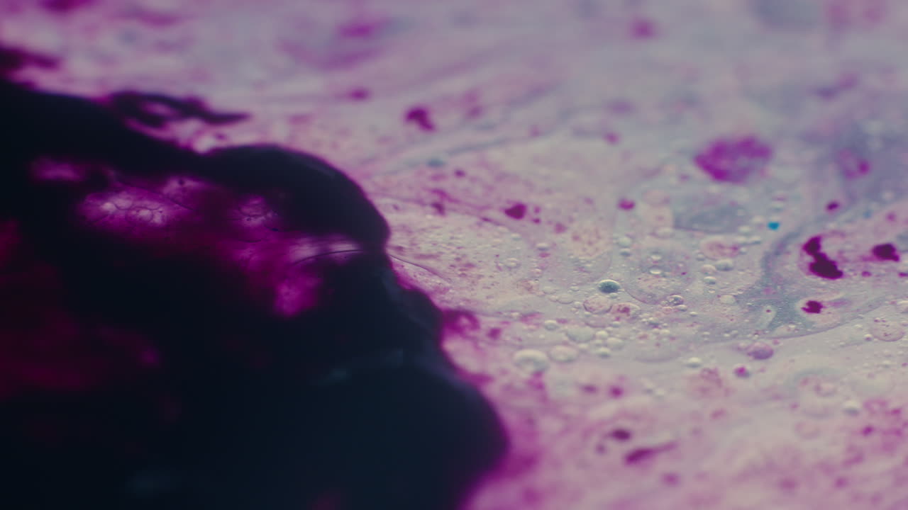 Colourful, organic, liquids macro shots buzzing and flowing