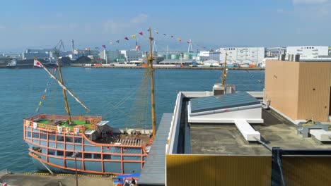 view of the boat and the buildings in osaka japan