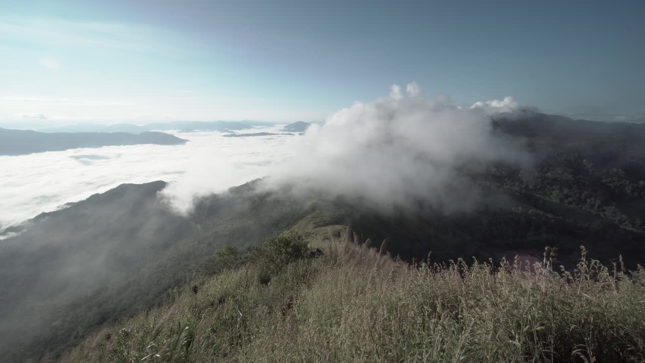 Majestic Mountain Landscape with Fog and Clouds