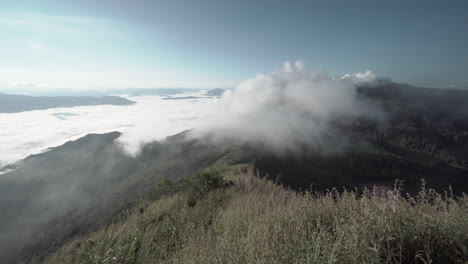 majestic mountain landscape with fog and clouds