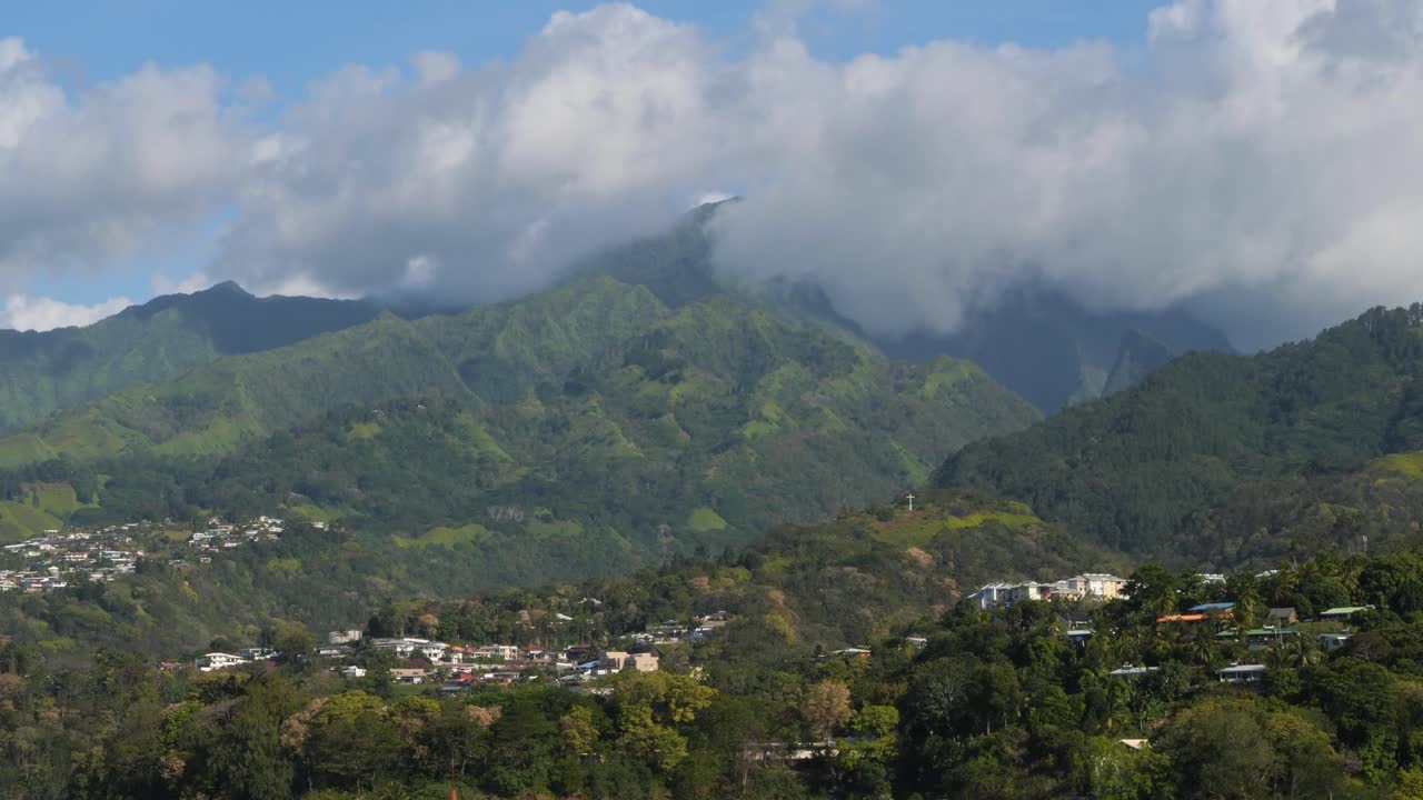 Landscape around the capital city of Papeete,Tahiti. Mount Aorai covered by clouds.