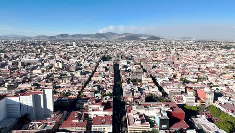 backwards drone shot at zocalo mexico city