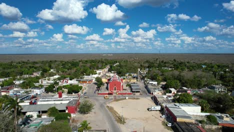 backwards drone shot of ancient church at tahmek yucatan mexico