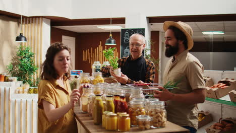 Elderly-food-shop-vendor-assists-clients