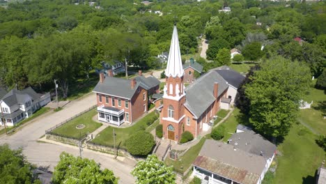 aerial establishing shot of christian church in rural america