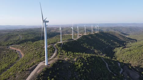 drone shot of a wind farm for eolic energy production in catalonia, spain