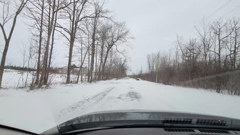 car driving through snow