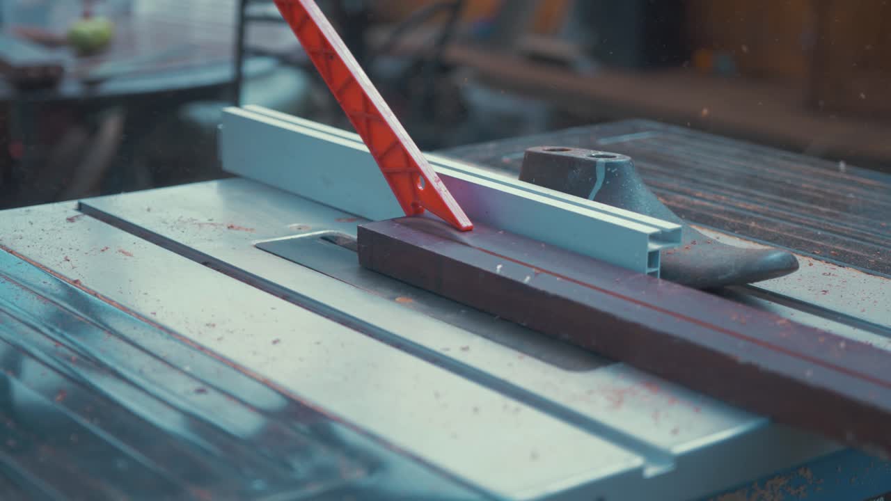 Cutting teak trim timber length for wood boat on table saw