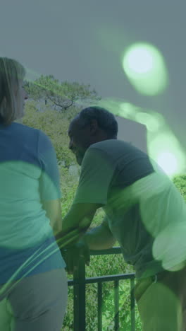 animation of light spots over senior diverse couple