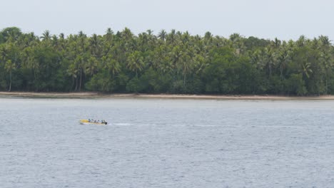 locals of aneityum island crossing to mystery island in a small boat,vanuatu