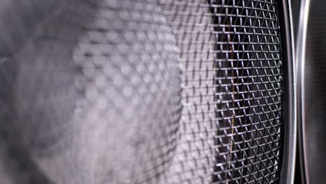 playing the bass speaker membrane. loopable. the movement of the vintage paper cone