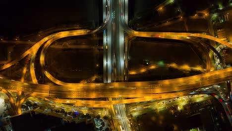 sunset night illuminated taipei city traffic road junction aerial down view 4k timelapse taiwan