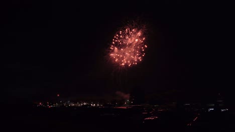 a huge colorful fireworks display at night on july 3