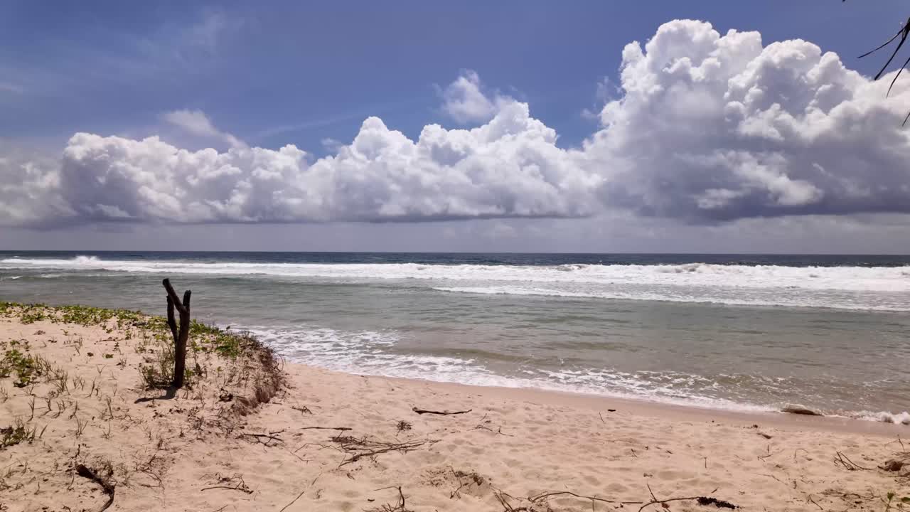 Beach tide flux reflux Sri Lanka South Asia sandy shore shoreline Stratocumulus clouds skyline