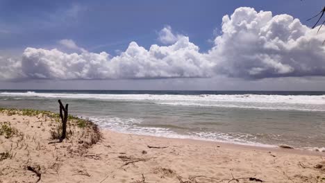beach tide flux reflux sri lanka south asia sandy shore shoreline stratocumulus clouds skyline