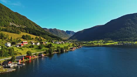 aerial over syvde on a lovely sunny day, vanylven municipality, norway