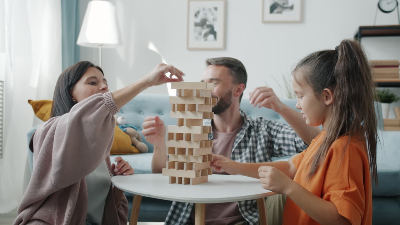 Family playing Jenga