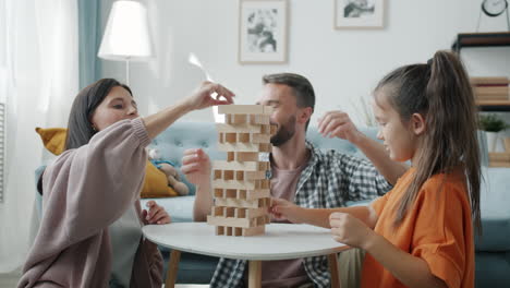Family playing Jenga