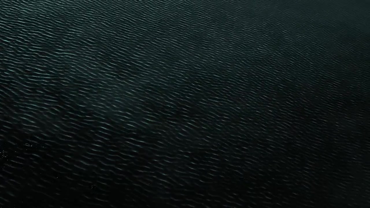Abstract Dark Water Surface with Subtle Ripples
